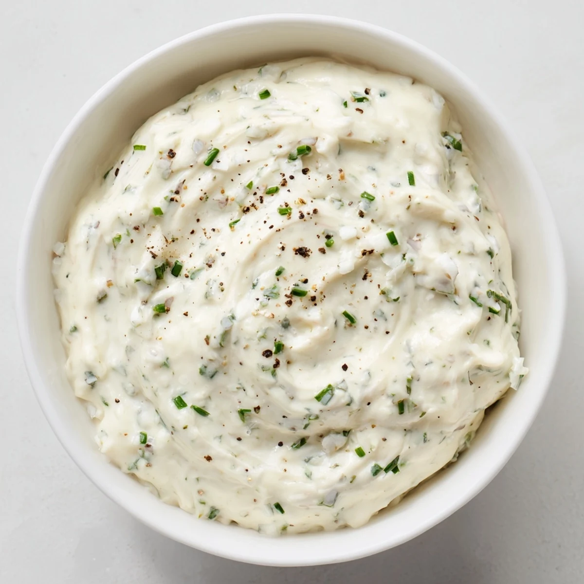 This flavorful creamy garlic dip is smooth, thick, and ideal for your next gathering.