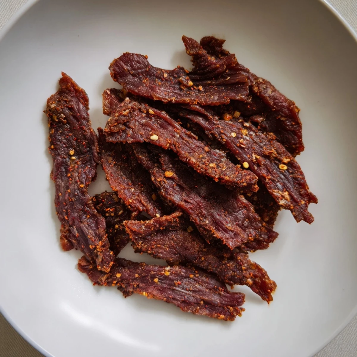 Close-up of Jerky Beef, showcasing perfectly dried strips, savory and ready to eat anytime.