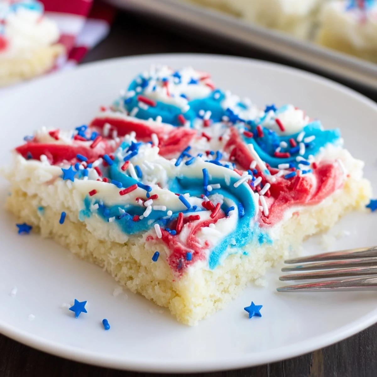 A plate of Patriotic Sugar Cookie Bars 4th Of July Dessert Recipe soft, buttery