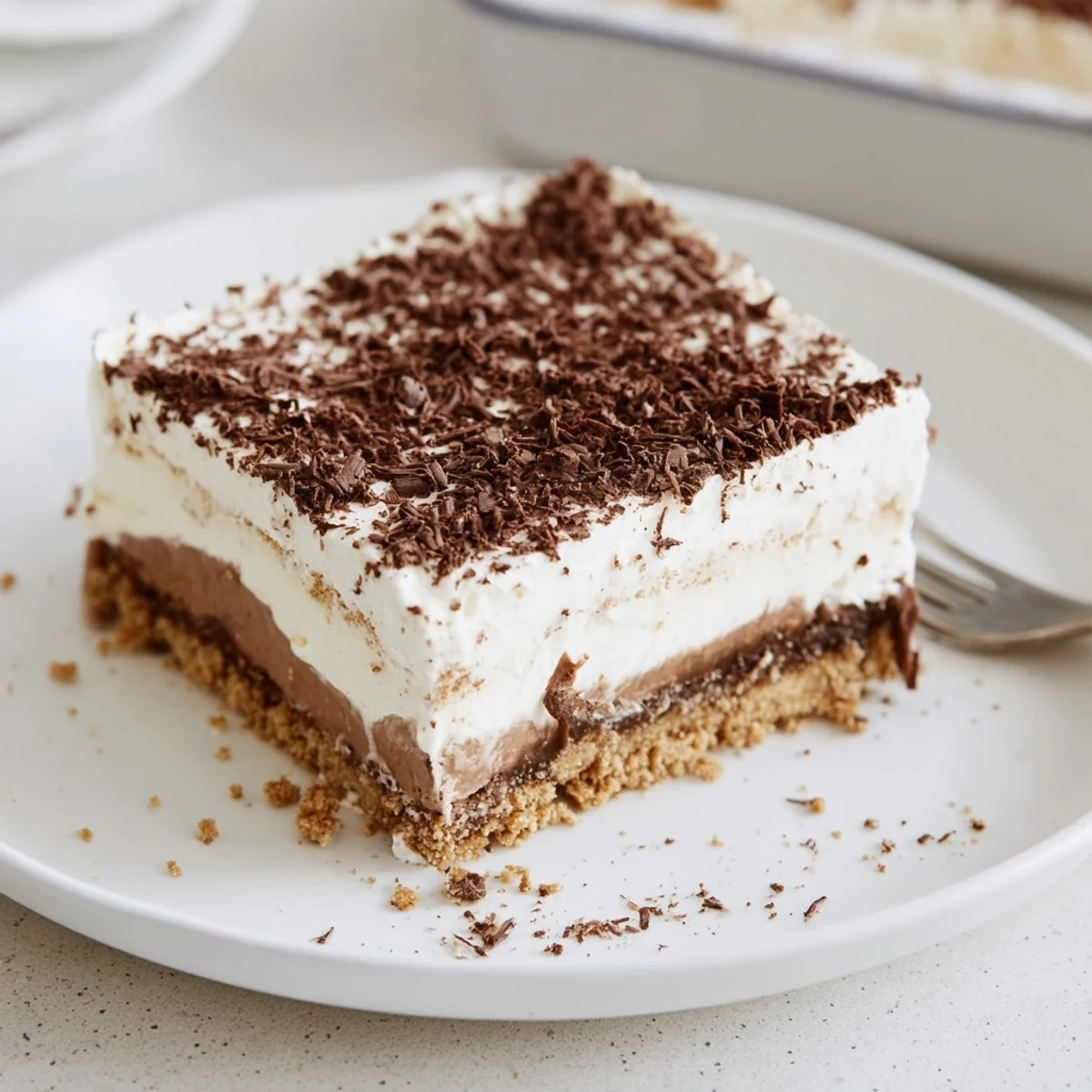 No Bake Layered Dessert with creamy vanilla pudding and crunchy graham base