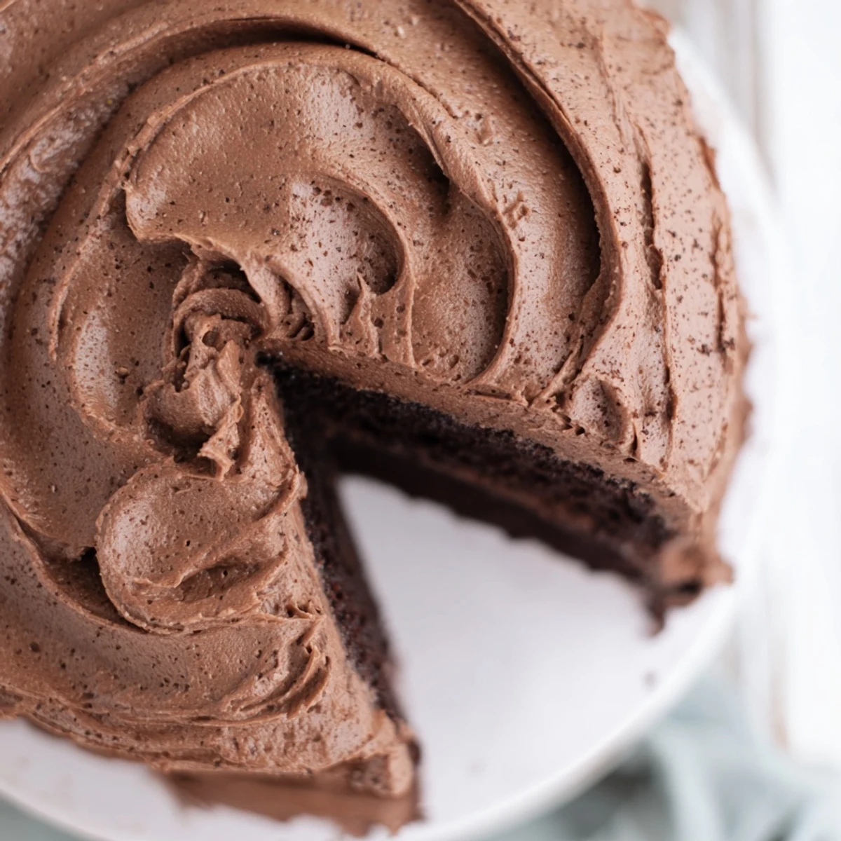 Moist double-layer Matilda chocolate cake topped with creamy dark chocolate buttercream